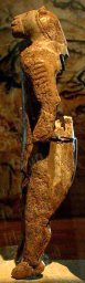 photo of an ivory hybrid carving of a man's body with a lion's head