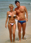 photo of a young man and woman at the beach