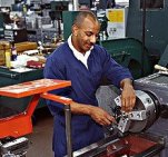 Photo of a machinist at work